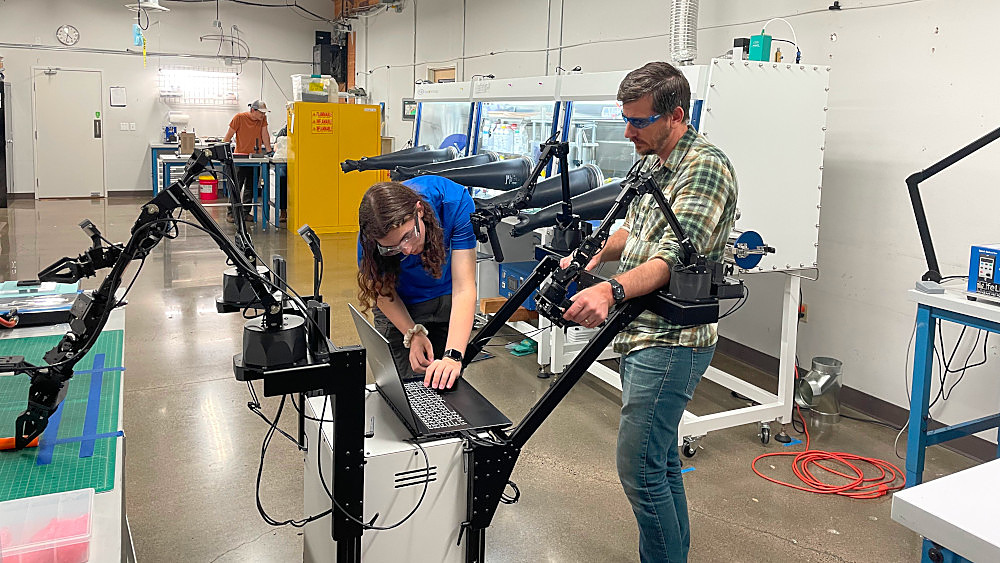 Wide view of the Rose City Robotics inspection rig in the battery lab